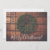 木箱の上のメリークリスマスのリース シーズンカード (正面)