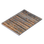 木製の板の古い壁の亀裂。ビーム作成 ノートブック (左側)