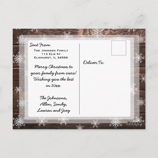 木製の素朴なクリスマスカードと雪の結晶の写真 ポストカード (裏面)