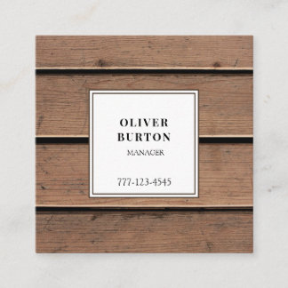 木製の背景にユニバーサル名刺。 スクエア名刺