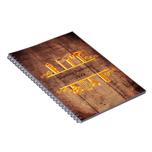 木製の茶色と金の工具を使った家の修理ビジネス ノートブック (右側)