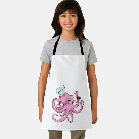 木製スプーンと調理師としてのタコ エプロン (インサイチュ)