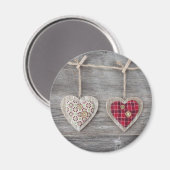 木製テーブルの上のハート マグネット (正面/裏面)