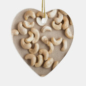 未加工カシューナッツの平面図はテーブルで分散しました セラミックオーナメント (右)