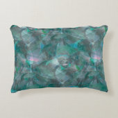 未完成の壁の漆喰の上にスポッティング緑がかったシアン アクセントクッション (正面)