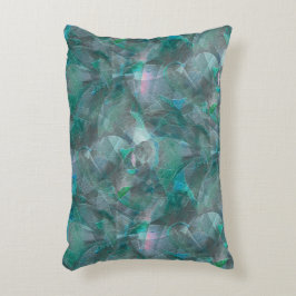 未完成の壁の漆喰の上にスポッティング緑がかったシアン アクセントクッション