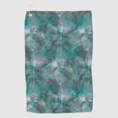 未完成の壁の漆喰の上にスポッティング緑がかったシアン ゴルフタオル (正面)