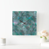 未完成の壁の漆喰の上にスポッティング緑がかったシアン スクエア壁時計 (ホーム)