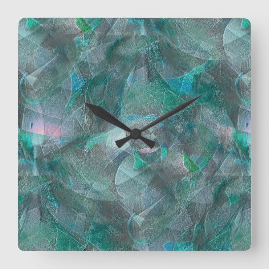 未完成の壁の漆喰の上にスポッティング緑がかったシアン スクエア壁時計 (正面)