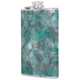 未完成の壁の漆喰の上にスポッティング緑がかったシアン フラスク