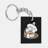 本とバークス – かわいい眠い読犬のデザイン キーホルダー (正面左)