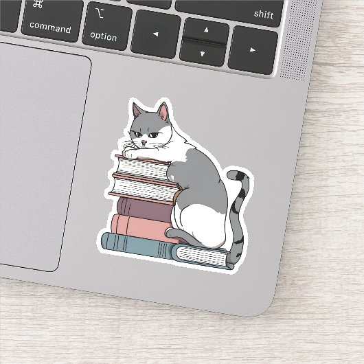 本に座るいたずら猫の防水 シール (詳細)