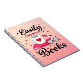 本に気を取られる ノートブック (右側)