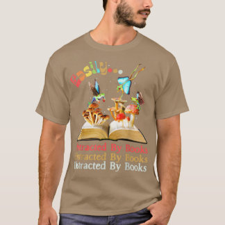 本に簡単に気を散らすカエルの妖精ダール Tシャツ