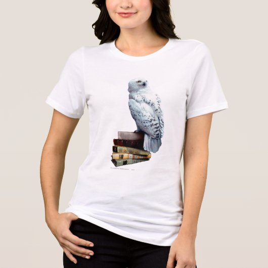 本の上のヘドウィグ トライブレンドＴシャツ (正面)
