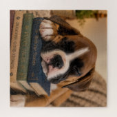 本の上の眠そうな子犬 ジグソーパズル (横)