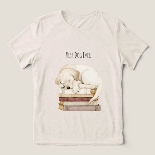 本の上の眠るクリーム色の犬 トライブレンドTシャツ (デザイン正面)
