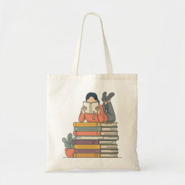 本の山の上で読書する可愛い女の子 トートバッグ