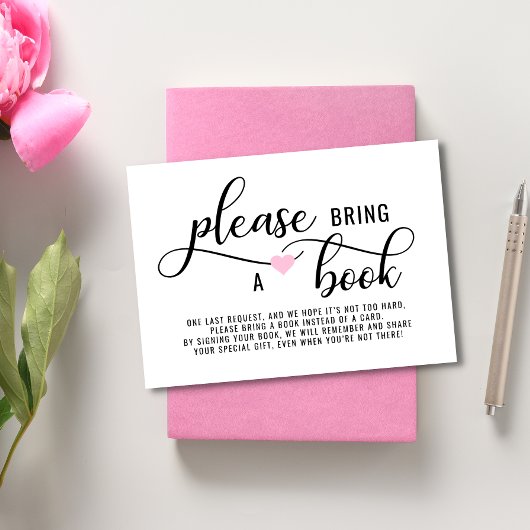 本をピンク色のハートで浴びせる エンクロージャーカード