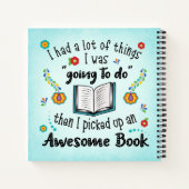 本を拾い上げ素晴らした ノートブック (裏面)