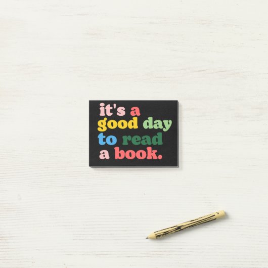本を読むのは良読い日だ ポストイット (デスク上)