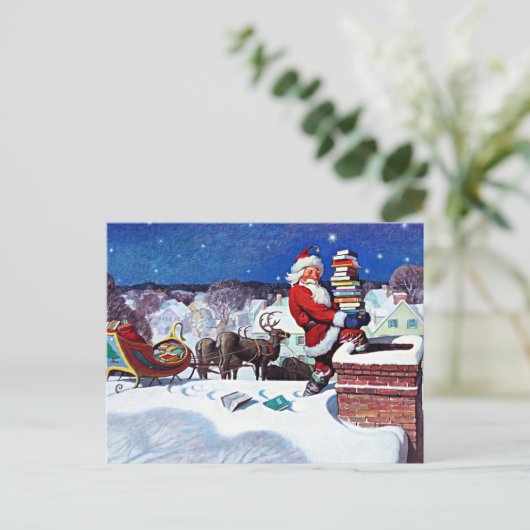本を配達するために煙突を降りるサンタ シーズンポストカード (スタンド正面)