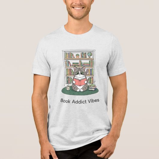本好きの子猫が読書する、ぬくぬくとした本棚の落書きデザイン トライブレンドTシャツ (正面)