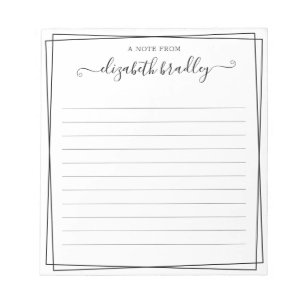 机の上から書かれたモノグラムの署名スクリプト ノートパッド