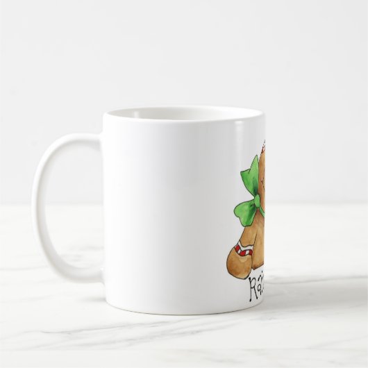 杖のマグを上げているジンジャーブレッドマン コーヒーマグカップ (左)