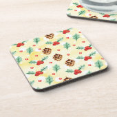 松のコーンとホリーのクリスマスパターン コースター (左側)