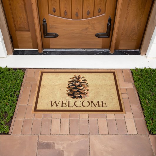 松の円錐 – ようこそ ドアマット (室外)