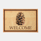 松の円錐 – ようこそ ドアマット (正面)