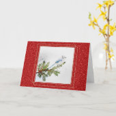 松の枝に止まるブルージェイのクリスマス カード (黄色い花)