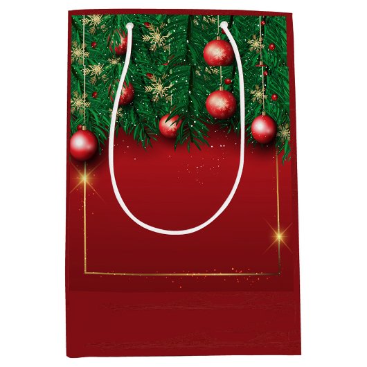 松の枝付きの赤いクリスマス ギフトバッグ