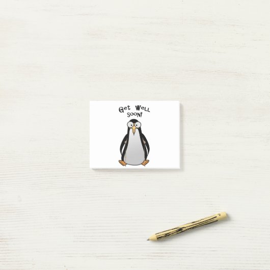 松葉杖に描かれたマンガのペンギン – すぐに元気になる。 ポストイット (デスク上)
