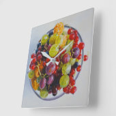 果実のボウル – 超現実的な果実の静止寿命 スクエア壁時計 (傾斜)