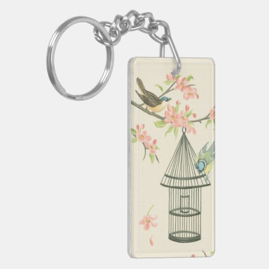 枝と鳥かごでとまる小さい鳥 キーホルダー (正面左)