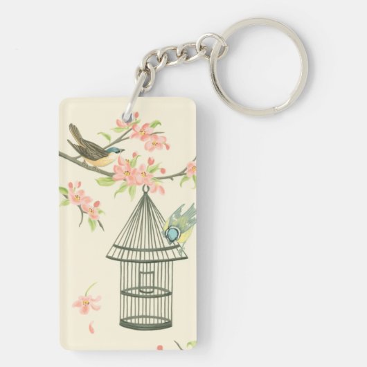 枝と鳥かごでとまる小さい鳥 キーホルダー (裏面)
