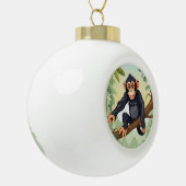 枝に可愛い尾を付けたチンパンジー セラミックボールオーナメント (左)