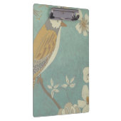 枝に止まった黄色、灰色、ベージュの鳥 クリップボード (右)