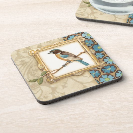 枝に茶色と青の鳥が顔を上げる コースター (左側)