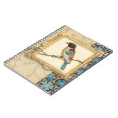 枝に茶色と青の鳥が顔を上げる ノートブック (左側)