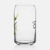 枝の上に水色の黒と緑のオリーブ ガラス缶 (左)