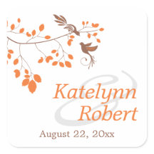 枝エレガントにオレンジとブラウンの結婚鳥