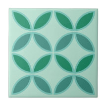 柔らかいティール（緑がかった色）と海緑の円または花の花びら