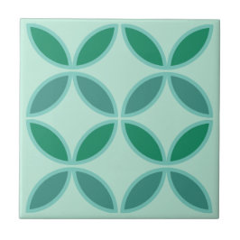 柔らかいティール（緑がかった色）と海緑の円または花の花びら タイル