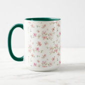 柔らかいピンクの水彩画の花模様 マグカップ (左)