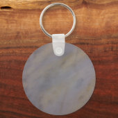 柔らかい岩 – 古い大理石。太陽と砂が爆発する。 キーホルダー (正面)