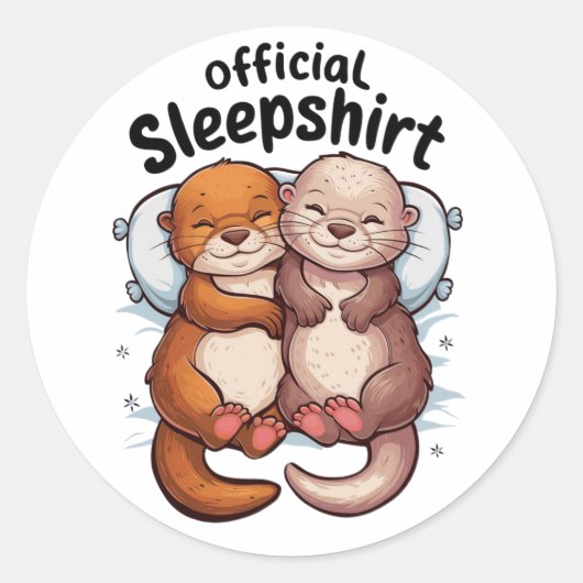 柔らかい白い枕の上で身を寄せ合う漫画のオッター ラウンドシール (正面)