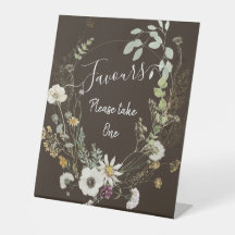 柔らかい色の野生の花の台座のサイン